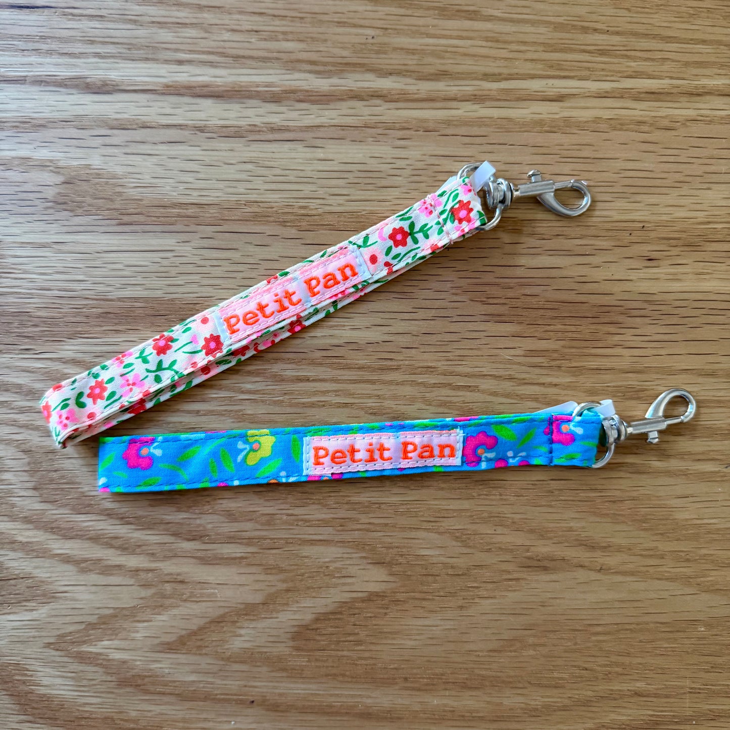 Petit Pan Pink Flower Power Wristlet Keychain