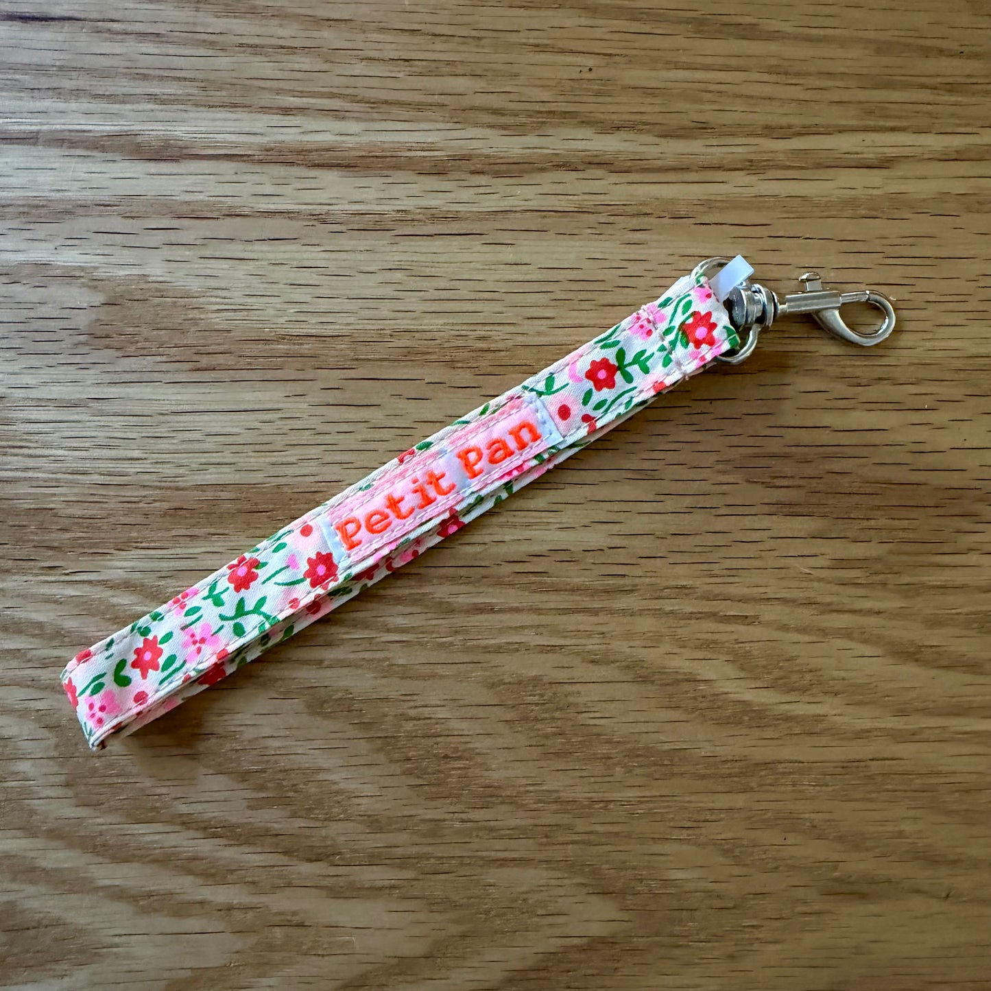 Petit Pan Pink Flower Power Wristlet Keychain