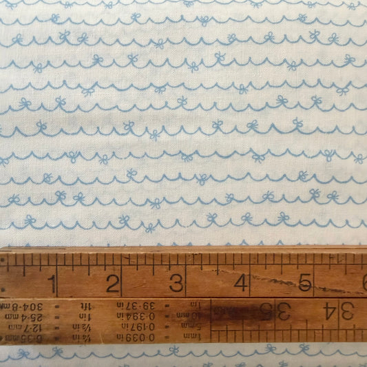 Blue Scallop with Bows on White